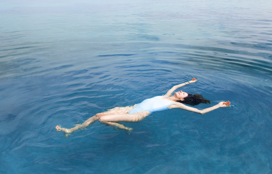 woman floating on the water