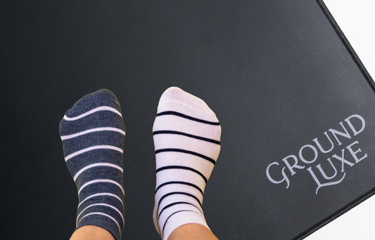 person's feet on GroundLuxe sheet