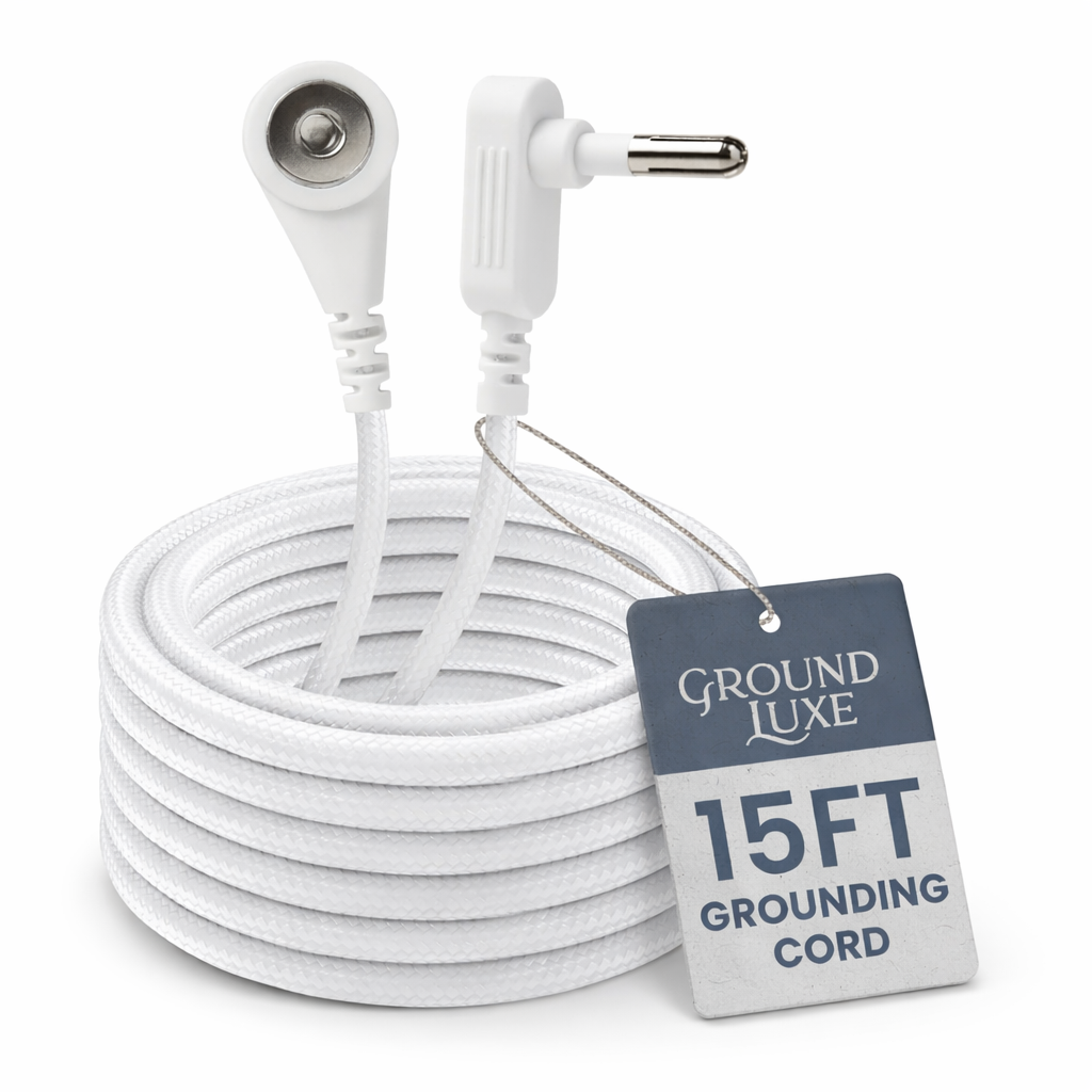 White grounding cord with connectors and 'Ground Luxe' tag on a white background