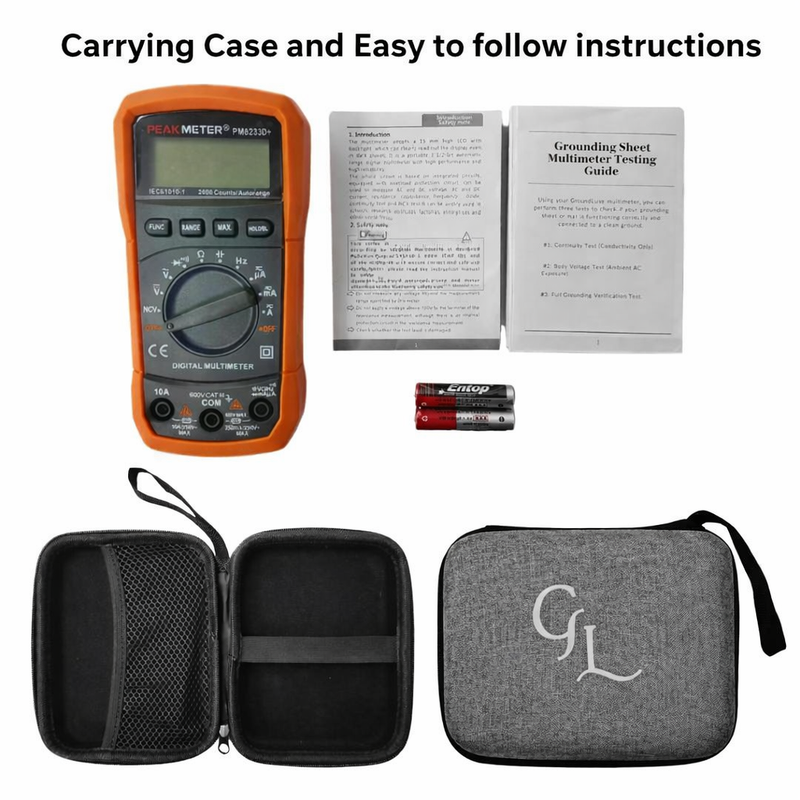 Digital multimeter with carrying case, batteries, and user manual on a white background