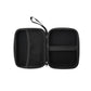 The interior of the GroundLuxe Multimeter Testing Kit case is a dark black and contains pockets to hold your grounding multimeter, multimeter cords, and your multimeter instruction guide.