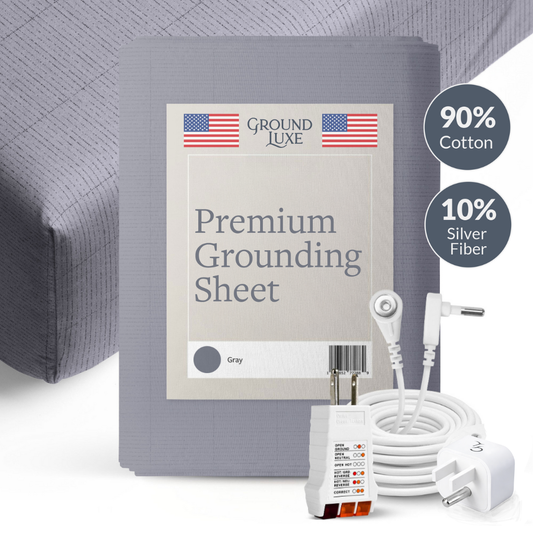 Gray grounding sheet with label, adapter, and cable on a white background


